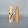 Rollo vacío de bambú entero barato al por mayor en una botella de cristal botella de perfume de la bola de rodillo de 10 ml con la cubierta de bambú